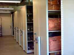 Air Guard Units love the space effieciency of aurora high density steel shelving to store readiness bags, rafts, and all sorts of deployment gear. avaible on gsa contract design is free! contact salt city records today!